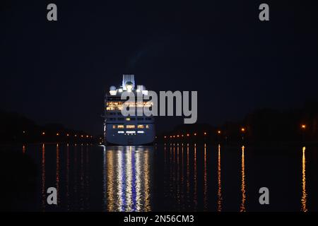 Cruise ship Sirena at night in the Kiel Canal, Schleswig-Holstein, Germany Stock Photo