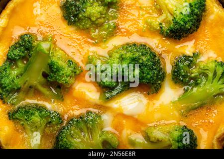 Macro close-up of healthy vegetarian egg omelette with green broccoli, food texture, diet and healthy clean eating concept copy space Stock Photo