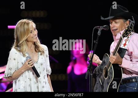 George Strait and Sheryl Crow performing together, two duets: “Here for ...