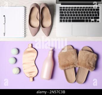 Flat lay composition with business items and home accessories on color background. Concept of balance between work and life Stock Photo