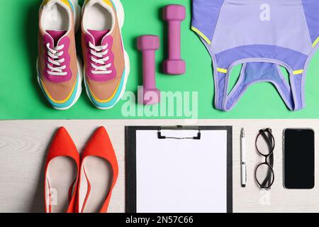 Flat lay composition with business items and sport accessories on color background. Concept of balance between work and life Stock Photo