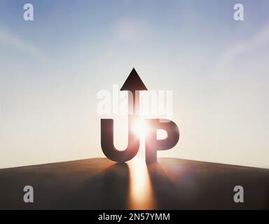 New year sunrise and sun rising bright between upward arrow and UP and goal and growth success business concept Stock Photo