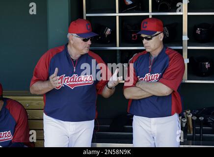 Cleveland Indians' manager Mike Hargrove talks with Sandy Alomar and Carlos  Baerga during a pitching change in a pause in action against the Minnesota  Twins at Cleveland, Aug. 2, 1995. (AP Photo/Mark