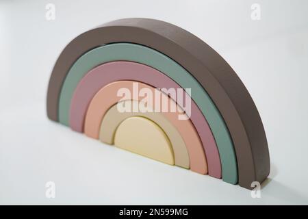 Wooden rainbow on a white background Stock Photo