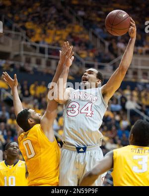 West Virginia's Devin Williams (5) looks to shoot during the second half of  an NCAA college basketball game Monday, Dec. 2, 2013, in Morgantown, W.Va.  West Virginia won 96-47. (AP Photo/Andrew Ferguson