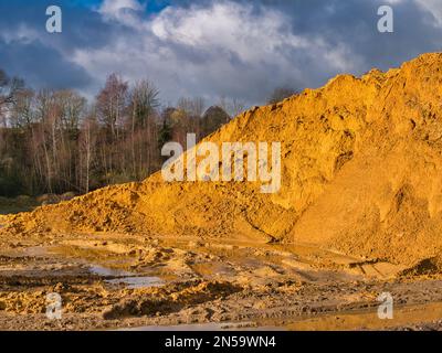 Sand quarried from the Kinnerton Sandstone Formation - red-brown to yellow sandstone, generally pebble-free, fine to medium grained, cross-stratified. Stock Photo