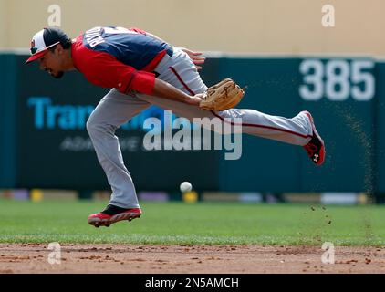 Washington Nationals' Anthony Rendon can't catch a ball hit by St