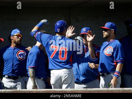 Milwaukee, WI, USA. 6th Apr, 2018. Chicago Cubs second baseman Javier Baez  #9 is congratulated after scoring on a triple and a throwing error in the  5th inning of the Major League