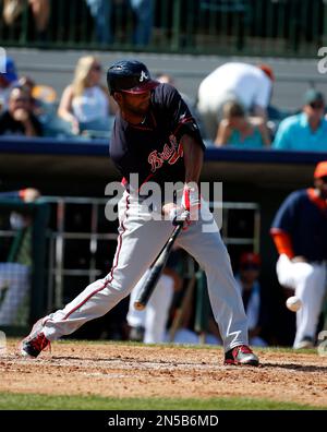 Houston Astros right fielder L.J. Hoes (28) bats in a spring exhibition  baseball game against the Atlanta Braves, Sunday, March 2, 2014, in  Kissimmee, Fla. The Astros won 7-4. (AP Photo/Alex Brandon