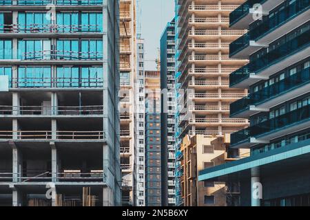 Abstract background of construction building site with glass and concrete facade. Modern architecture. Industrial concept Stock Photo
