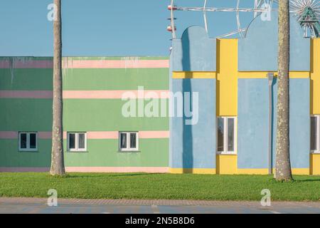 Exterior walls of pastel colored building with geometric lines and shadows Pastel tones, shapes, light and shadows. Abstract minimalistic architecture Stock Photo