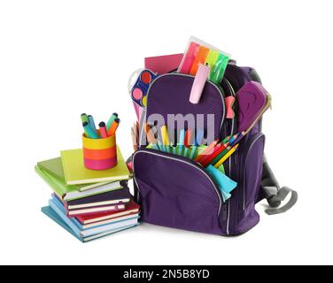 Purple backpack with different school stationery on white background Stock Photo