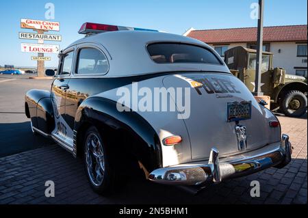 An old American police car Chevrolet Fleetmaster parked on the street Stock Photo