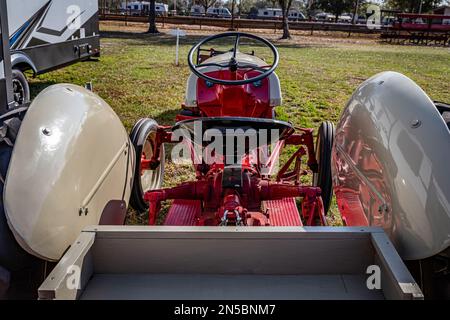 Fort Meade, FL - February 22, 2022: High perspective rear view of a 1948 Ford 8N Tractor at a local tractor show. Stock Photo