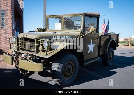 An Old green Dodge M37 pickup military truck with the white star of the U.S. ARMY Stock Photo