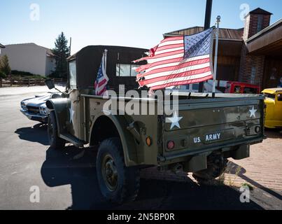 An Old green Dodge M37 pickup military truck with the white star of the U.S. ARMY Stock Photo