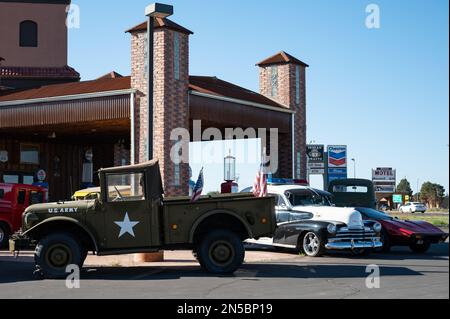 An old green Dodge M37 pickup military truck with the white star of the U.S. ARMY Stock Photo