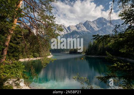 lake Eibsee with Sassen Island in front of Zugspitze Massif, Germany, Bavaria, Grainau Stock Photo