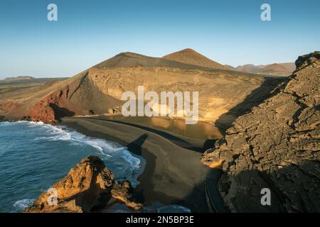 EL Golfo lagoon in a tuff crater by the sea, aerial photo, Canary Islands, Lanzarote, Yaiza Stock Photo