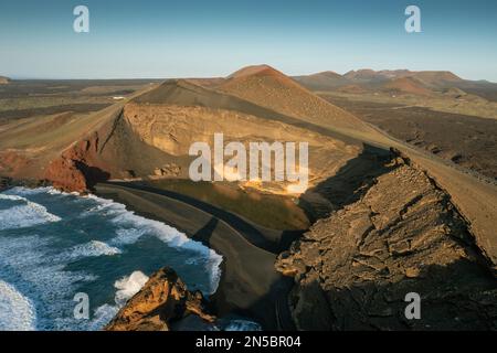 EL Golfo lagoon in a tuff crater by the sea, aerial photo, Canary Islands, Lanzarote, Yaiza Stock Photo