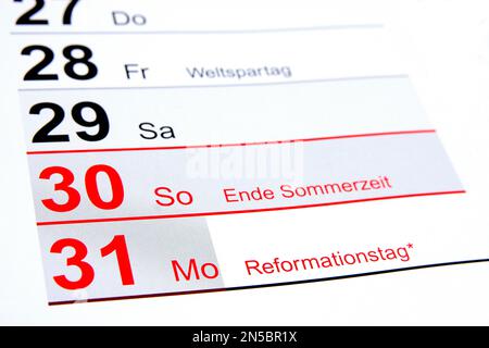 year calendar 2022 in German, ending of summertime, Reformation Day Stock Photo