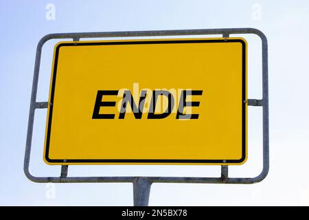 city sign against blue sky lettering Ende, end - Composing, Germany Stock Photo