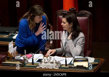 Relations with Parliament Minister Maria Elena Boschi, left, talks with Lower Chamber spokeswoman Laura Boldrini prior to a confidence vote in the Chamber of Deputies, in Rome, Tuesday, Feb. 25, 2014. The Senate voted 169-139 to confirm Premier Matteo Renzi's broad coalition, which ranges from his center-left Democrats to center-right forces formerly loyal to ex-premier Silvio Berlusconi. Renzi needed at least 155 votes to clinch the victory, one of two mandatory confidence votes. The second vote, in the Chamber of Deputies, is expected later Tuesday. Renzi's coalition has a comfortable majori