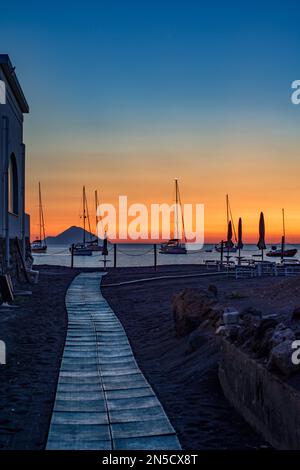 View from Black Sands beach at sunset, Vulcano Stock Photo