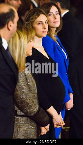 New Italian ministers, from left, Interior Minister Angelino Alfano, Minister for Regional Affairs Maria Carmela Lanzetta, Semplification and Public Administration Minister Marianna Madia, and Relations with Parliament Minister Maria Elena Boschi attend their swearing in ceremony as members of Italy's new government lead by Premier Matteo Renzi at the Quirinale Presidential Palace in Rome, Saturday, Feb. 22, 2014. At 39, Renzi becomes Italy's youngest premier. He is also the third straight premier to come into the office without being elected. The last premier who stood for election was the sc