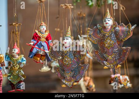Marionette souvenirs for sale at the archeological site in Bagan, Myanmar Stock Photo