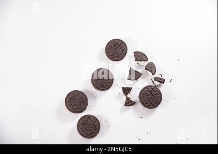 Oreo Flavored Breakfast Cereal, black and white dry breakfast rings. Cup with delicious breakfast and milk. High quality FullHD footage Stock Photo