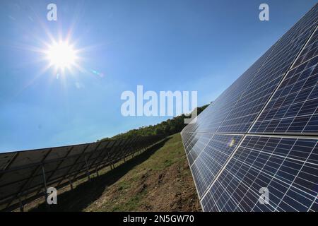 Power plant using renewable solar energy with sun. Solar plant panel for green energy power. Stock Photo