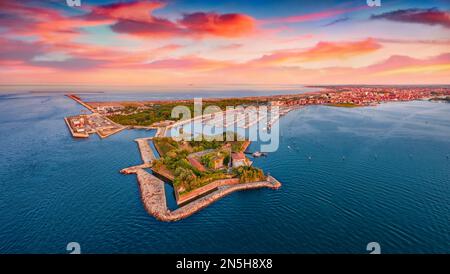 Great sunset on Adriatic sea. Stunning summer view from flying drone of San Felice fortress, Italy, Europe. Traveling concept background. Stock Photo