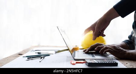 In engineering bureau engineers discussing technical construction Stock Photo