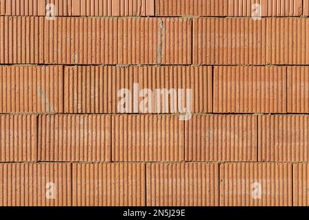 Background with wall made of red bricks Stock Photo