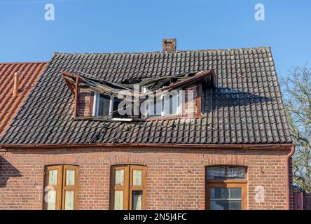 Detail shot of an old house with a destroyed roof Stock Photo