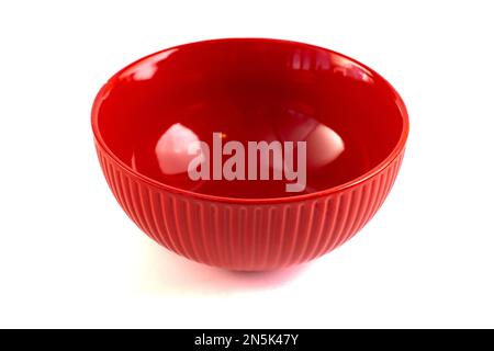 An Empty and Clean Red Bowl Isolated on a White Background Stock Photo