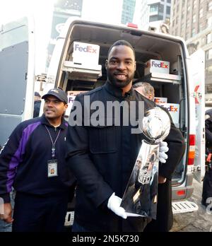 New York Giants - New York Giants defensive end Justin Tuck poses for  pictures with the Super Bowl XLVI trophy and ring during a ceremony at  Tiffany & Co., Wednesday, May 16