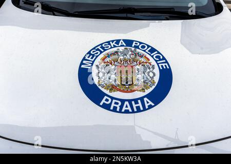 Logo of the local police in Prague, Czech Republic, on the bonnet of a police car. Stock Photo