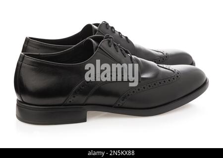 Black classic leather men's shoes with laces insulated on white background Stock Photo