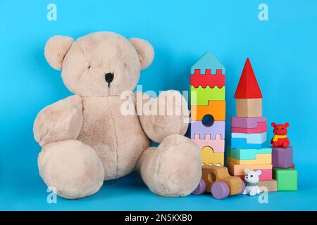 Set of different toys on blue background Stock Photo