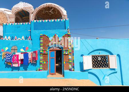 Aswan, Egypt; February 12, 2023 - Colourful Nubian houses in Aswan, Egypt Stock Photo