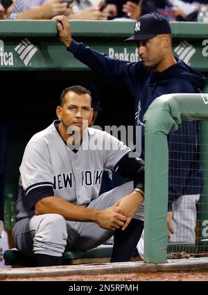 Derek Jeter and the entire New York Yankees team tip their hats to the fans  after the game against the Baltimore Orioles in the final game ever at  Yankee Stadium in New