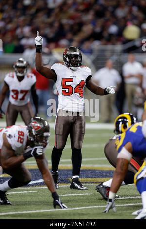 Tampa Bay Buccaneers Lavonte David (54) and Andrew Adams stop Dallas  Cownboys Ezekiel Elliott after a 1-yard gain during their NFL game AT&T  Stadium in Arlington, Texas on December 23, 2018. Photo