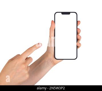 Lodz, Poland February 07 2023 Hand closeup holding smartphone mockup, mobile phone frame, finger pointing on screen, blank empty display template. Stock Photo