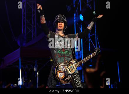 Nathalia Henao and guitarist Dj Ashba of Guns N' Roses arrive at the ...