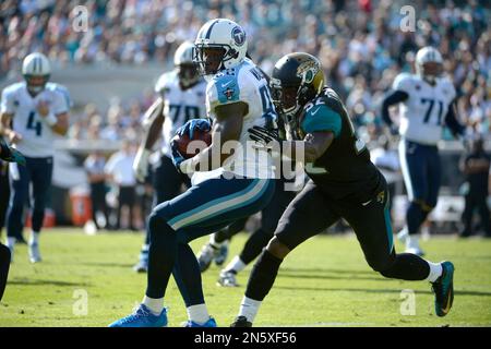 Jacksonville Jaguars linebacker J.T. Thomas is seen on the sidelines during  an NFL football game against the Cleveland Browns Sunday, Dec. 1, 2013, in  Cleveland. Jacksonville won 32-28. (AP Photo/David Richard Stock