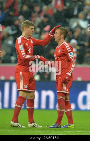Munich's Mario Goetze, right, and Munich's Toni Kroos celebrate