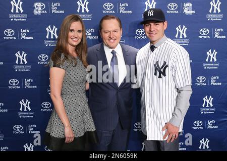 Jacoby Ellsbury, right, and his wife Kelsey, left, pose for a