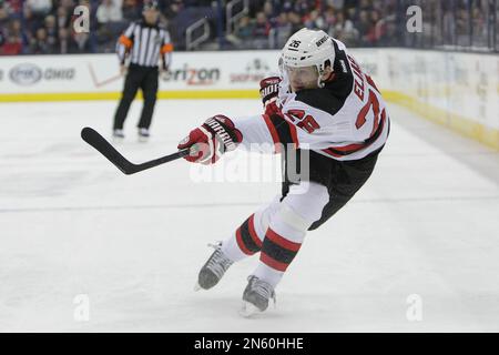 New Jersey Devils' Patrick Elias takes a break during a team
